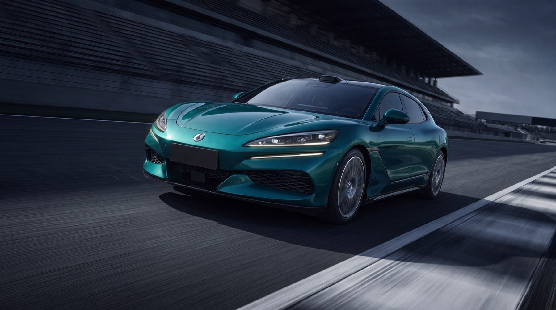 Green car moving on a track