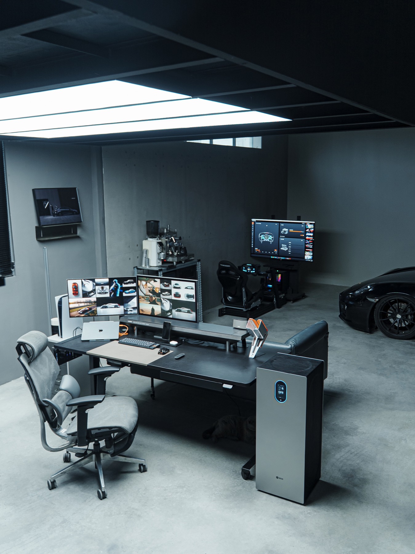 Garage studio creator desk under large soft lights