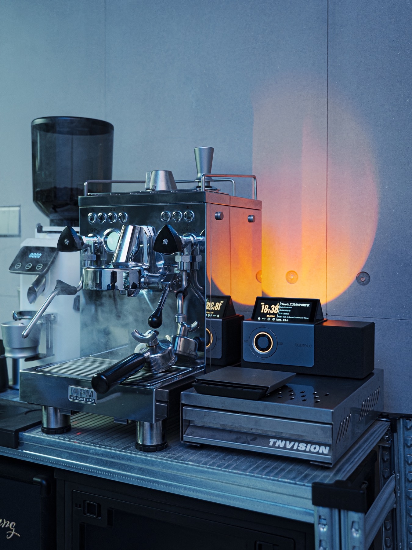 Espresso machine and ambient orange light detail
